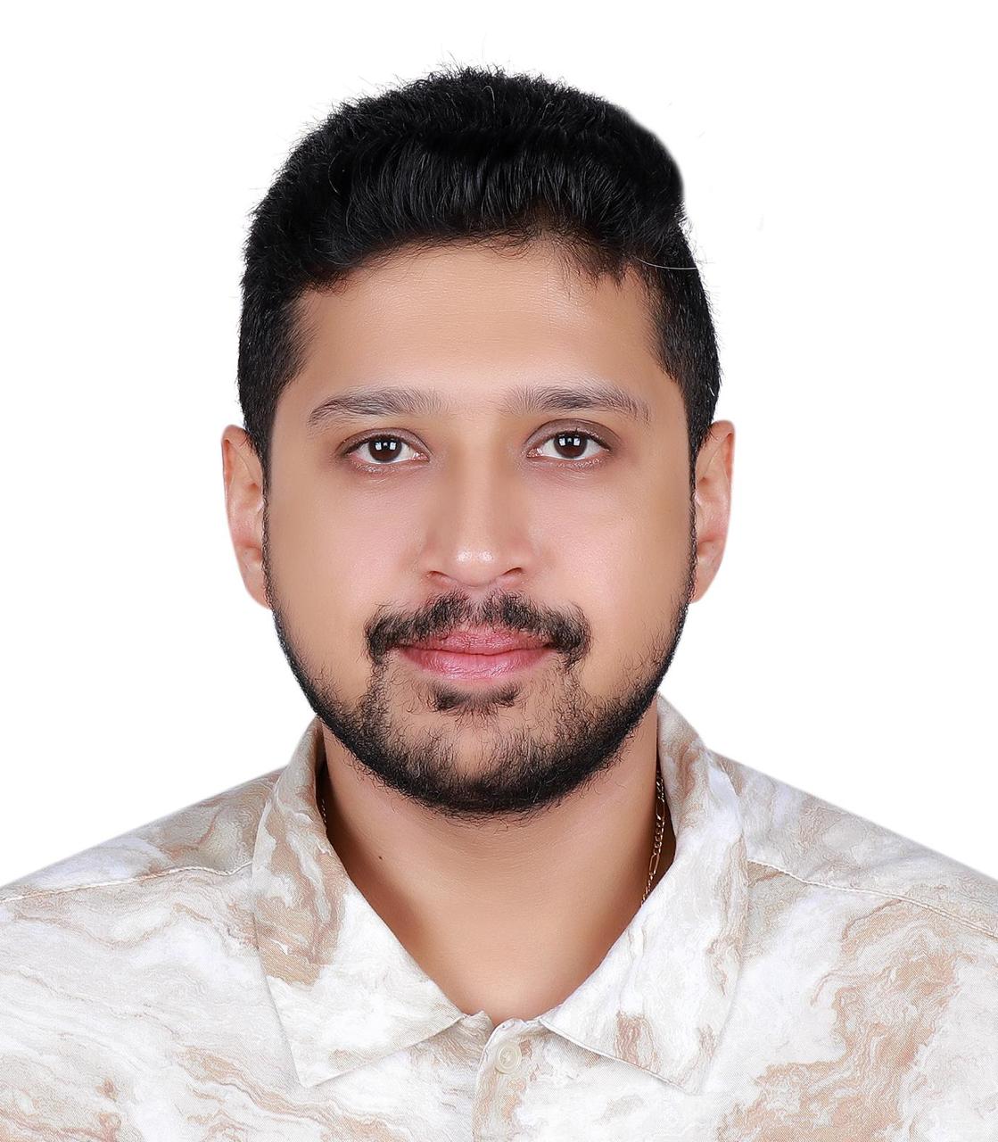 Dr. JOHNSON VARGHESE ABRAHAM